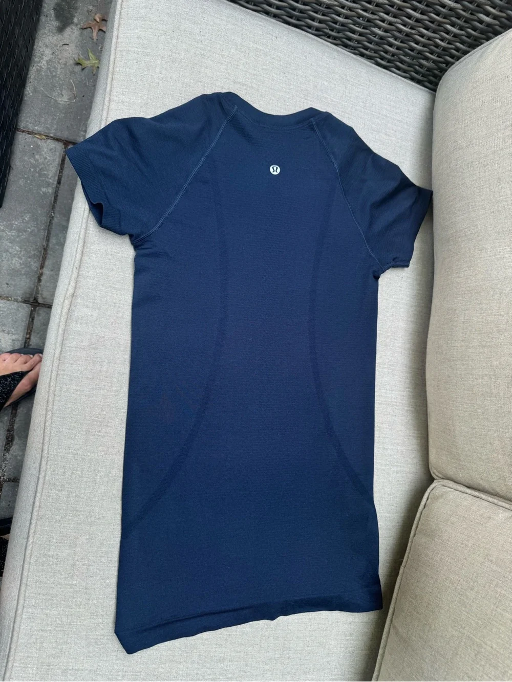 Navy Athleta shirt with White Ironman Logo